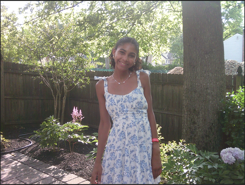 Jasmine smiling outside